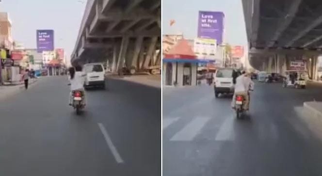 چلتی موٹر سائیکل پر بیوی نے شوہر پر چپلوں سے "پٹائی" کر دی، ویڈیو وائرل